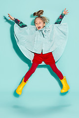 Image showing Little girl posing in fashion style wearing autumn clothing.