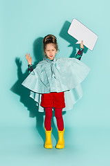 Image showing Little girl posing in fashion style wearing autumn clothing.