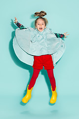 Image showing Little girl posing in fashion style wearing autumn clothing.