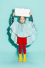 Image showing Little girl posing in fashion style wearing autumn clothing.