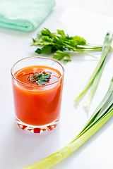 Image showing Natural tomato juice and veggies