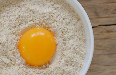 Image showing Flour and egg ready for mixing