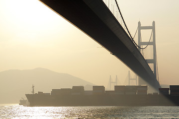 Image showing long bridge in sunset hour