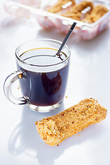 Image showing Black Coffee with eclairs