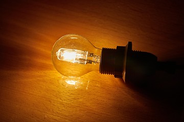 Image showing Light bulb on a table