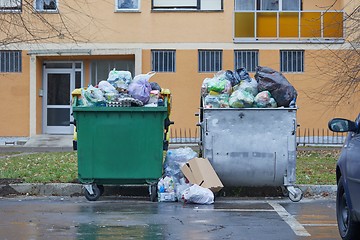 Image showing Garbage Containers Full, Overflowing
