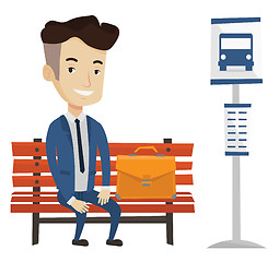 Image showing Businessman waiting for bus at the bus stop.