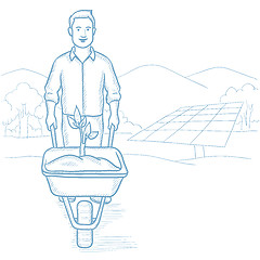 Image showing Worker of solar power plant with sprout in cart.
