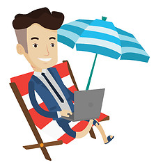 Image showing Businessman working with laptop on the beach.
