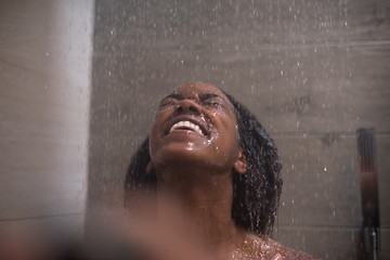 Image showing African American woman in the shower