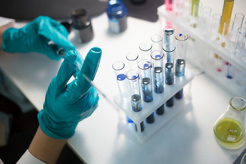 Image showing Lab technician carries chemical experiments