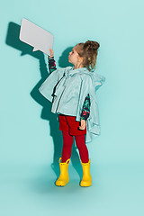 Image showing Little girl posing in fashion style wearing autumn clothing.