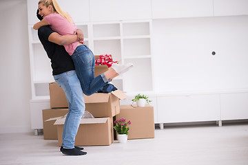 Image showing happy Young couple moving in new house