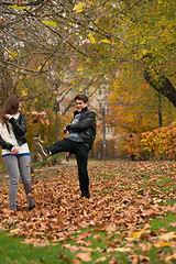 Image showing Happy young Couple in Autumn Park