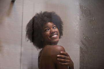 Image showing African American woman in the shower