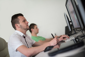 Image showing a group of graphic designers at work