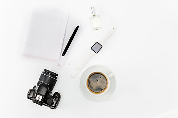 Image showing Coffee and personal items on desktop