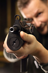 Image showing Military exercises on the firing range The soldier fires a rifle at the shooting range