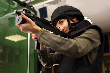 Image showing The woman at the shooting range.