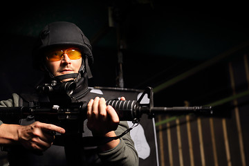 Image showing The man with a gun. Military