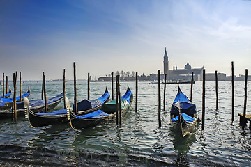 Image showing Gondolas moored in front of Saint Mark square with San Giorgio d
