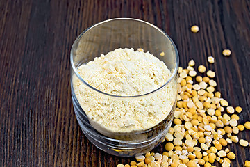 Image showing Flour pea in glassful on board