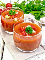 Image showing Soup tomato in two glasses with parsley on napkin