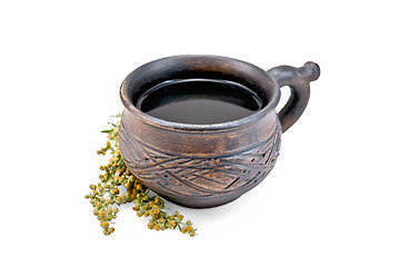 Image showing Tea with wormwood in clay cup