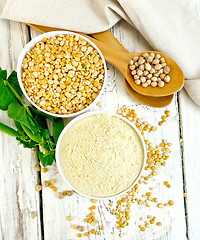 Image showing Flour pea and split pease in bowls on board top