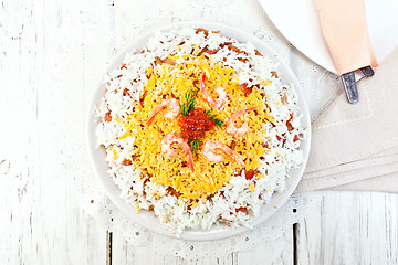 Image showing Salad of salmon and seafood on board top