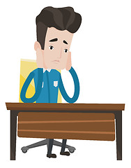 Image showing Exhausted sad student sitting at the table.