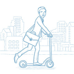 Image showing Man riding kick scooter in the city street.