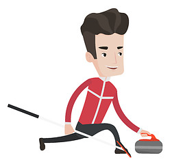 Image showing Curling player playing curling on curling rink.