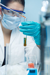 Image showing Young technician with chemical substances