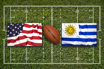 Image showing USA vs. Uruguay flags on rugby field