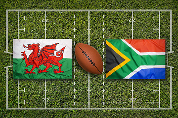 Image showing Wales vs. South Africa flags on rugby field