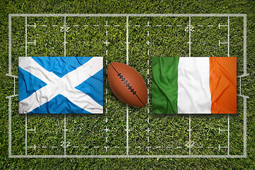 Image showing Scotland vs. Ireland flags on rugby field