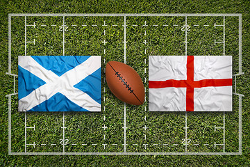 Image showing Scotland vs. England flags on rugby field