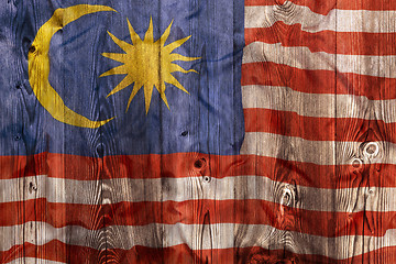 Image showing National flag of Malaysia, wooden background