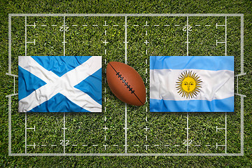 Image showing Scotland vs. Argentina flags on rugby field