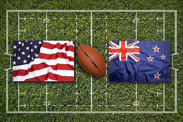 Image showing USA vs. New Zealand flags on rugby field