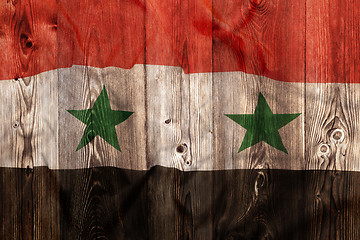 Image showing National flag of Syria, wooden background