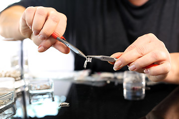 Image showing Jewelry, silver earring with crystals