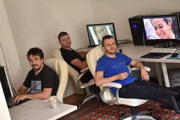 Image showing a group of graphic designers at work