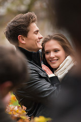 Image showing Autumn portrait of attractive happy couple