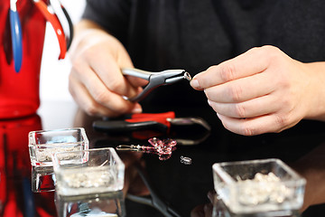 Image showing Creating jewelry.