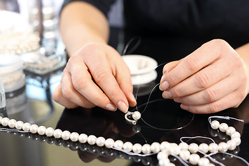 Image showing Creating jewelry with pearls Pearls, beads Threading beads