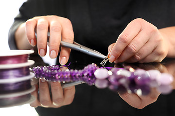 Image showing Creating jewelry. Workshop jewelery, working on an exclusive jewelry