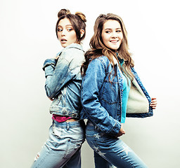 Image showing best friends teenage girls together having fun, posing emotional on white background, besties happy smiling, lifestyle people concept 