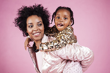 Image showing young pretty african-american mother with little cute daughter h